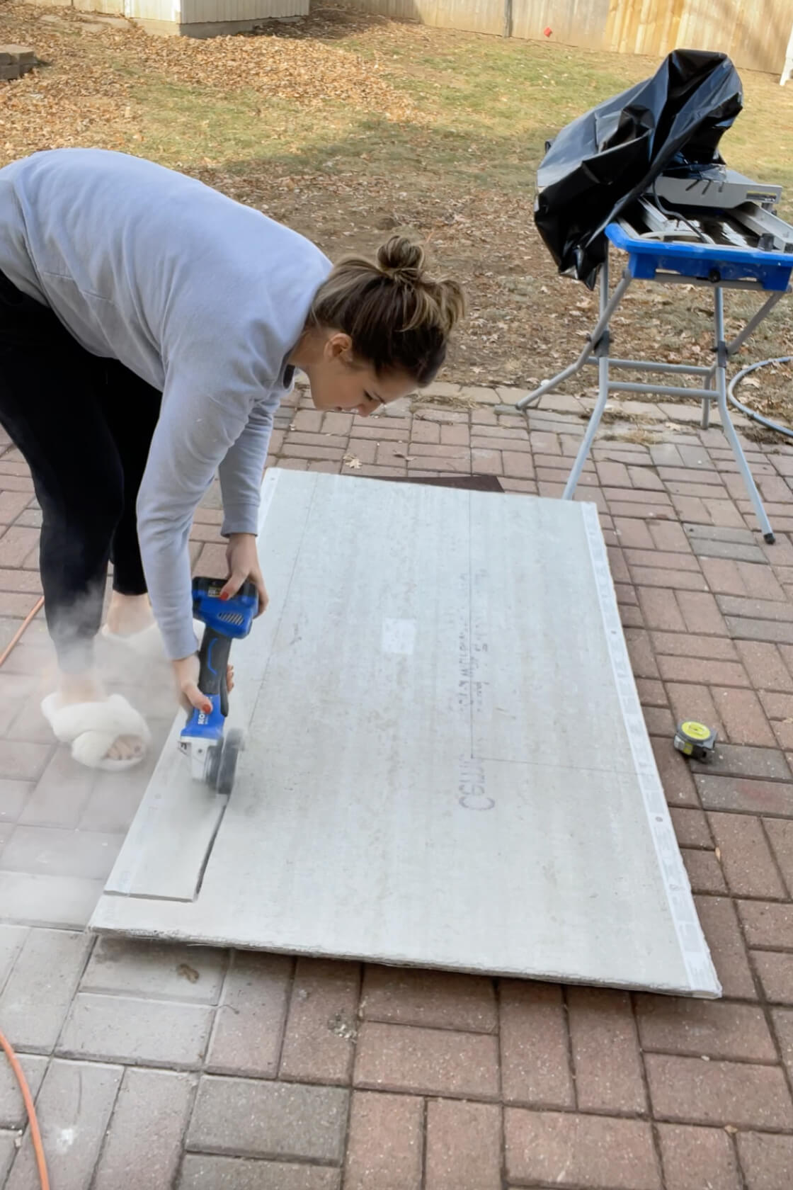 Cutting out cement board for the backing on my stone fireplace surround.